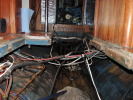 The bilge sup, associated pumps and the front end of the engine compartment with wiring and plumbing now accessible. Removing the tank revealed several other pieces of abandoned wiring, bilge ventilation and piping. The question now is, what to use all t
